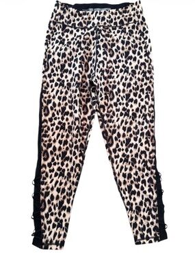 Victoria Secret animal print leggings  black mesh side panels cross cross detail